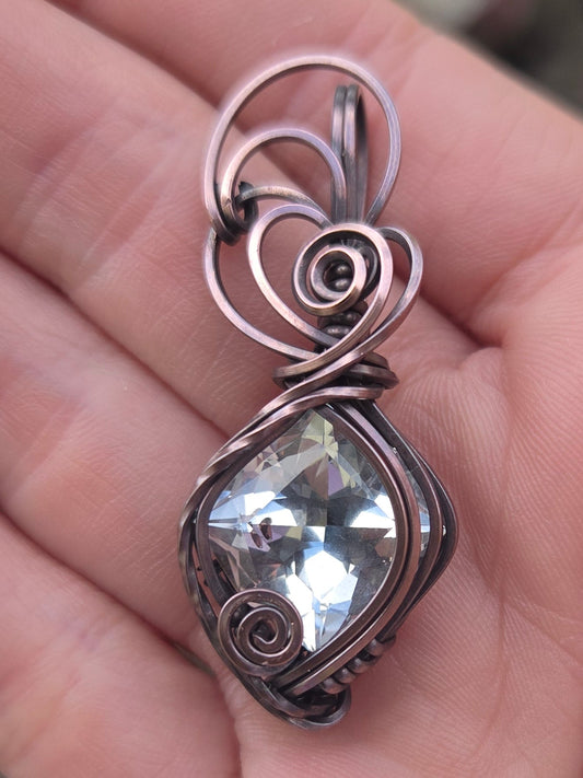 13.4 Carat Faceted Topaz Gemstone Copper Pendant