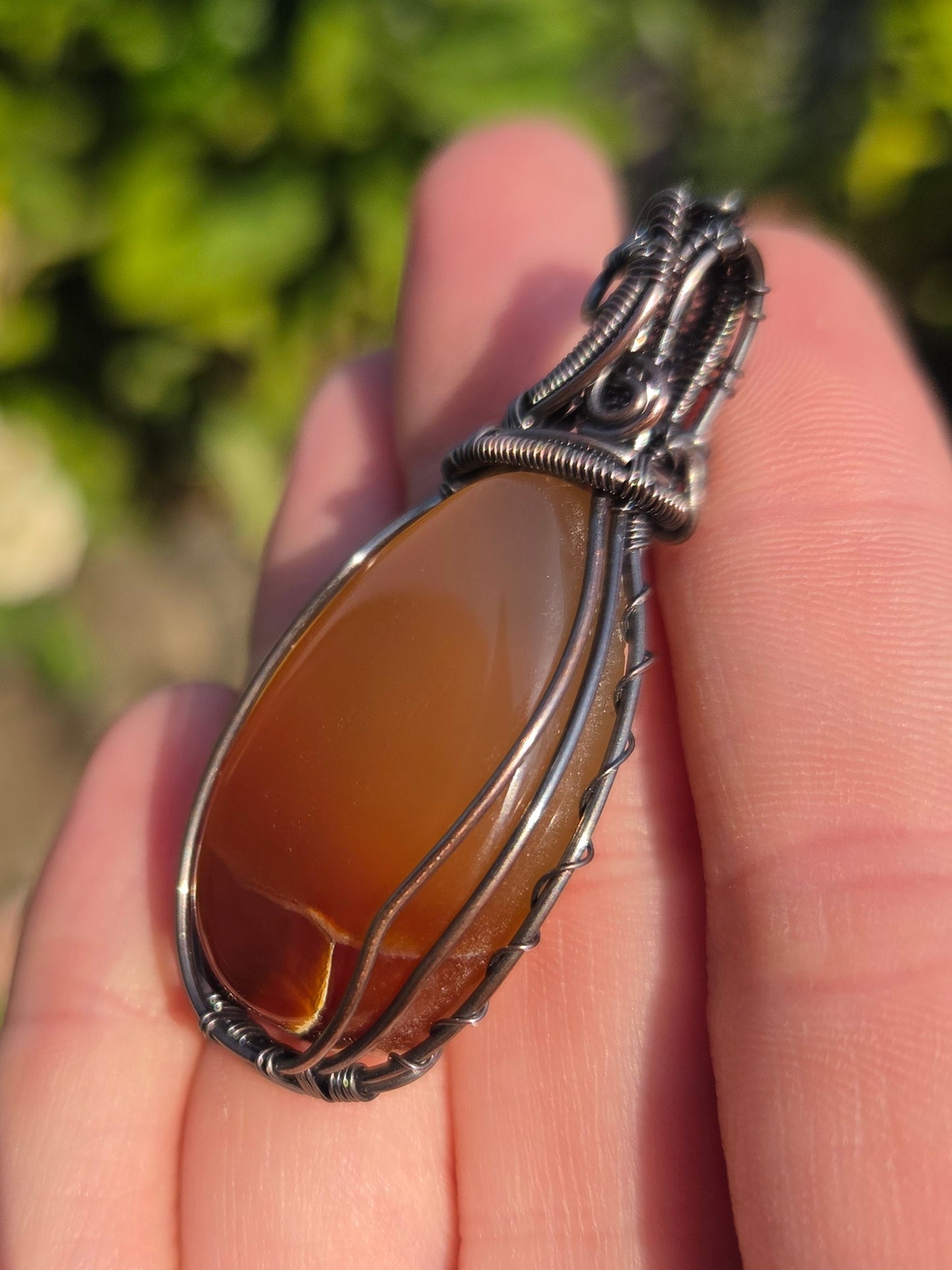 Handcrafted Oxidized Copper Pendant Featuring Carnelian Agate Cabochon Centerpiece